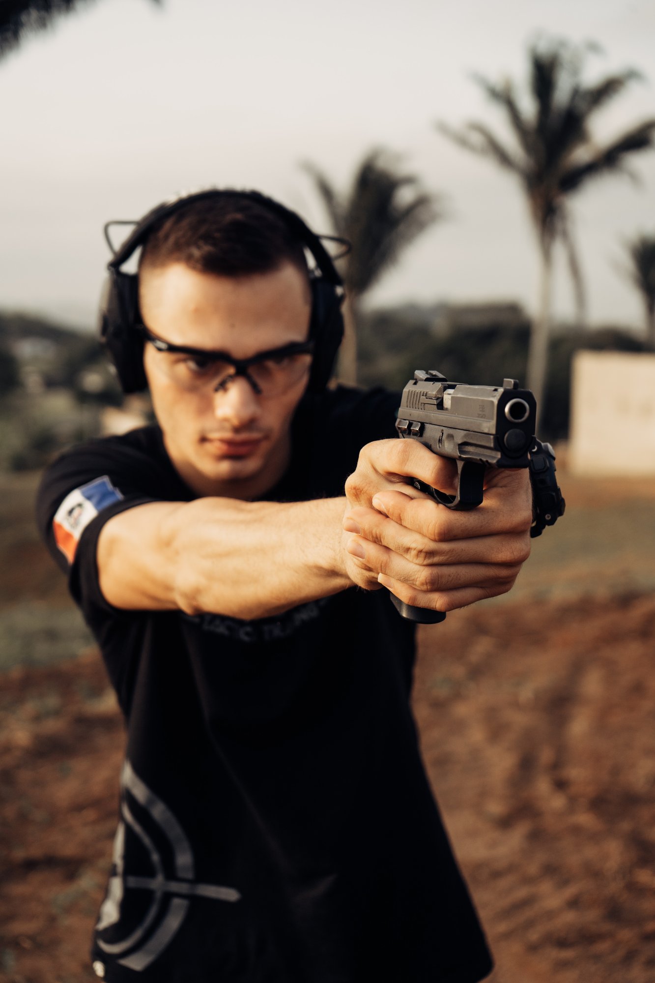 Handgun shooting with eye and ear protection
